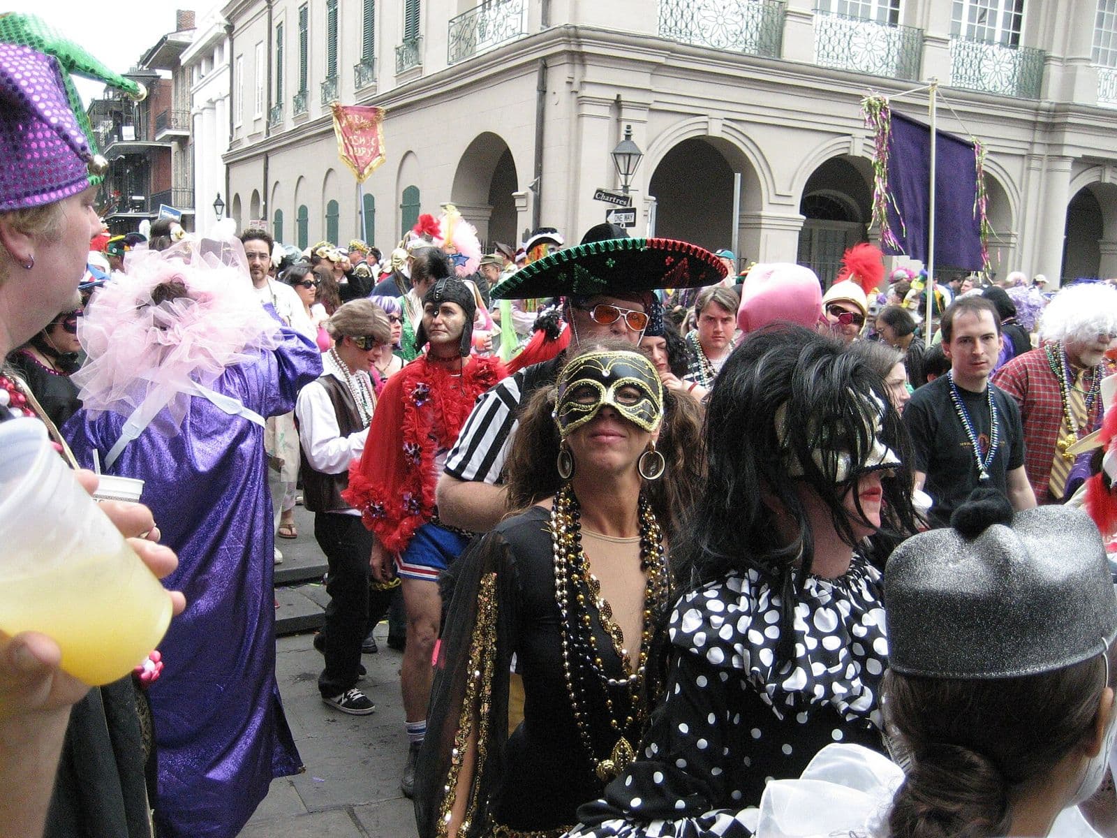 Costumed revellers fill Jackson Square in front of the Cabildo on Mardi Gras Day